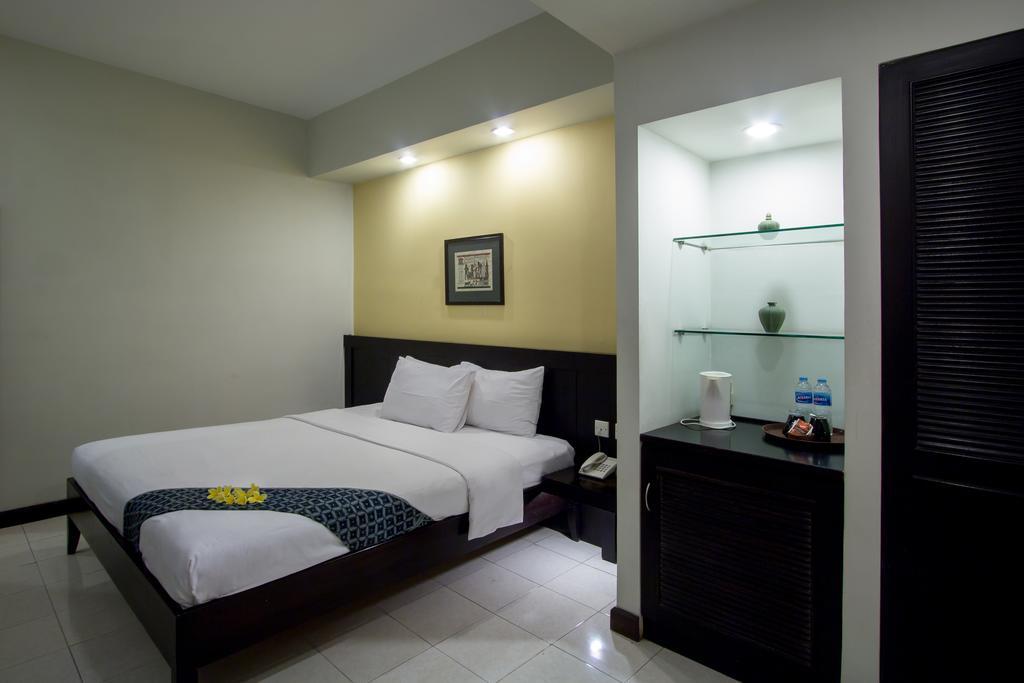 Hotel Quirin Semarang Rum bild
